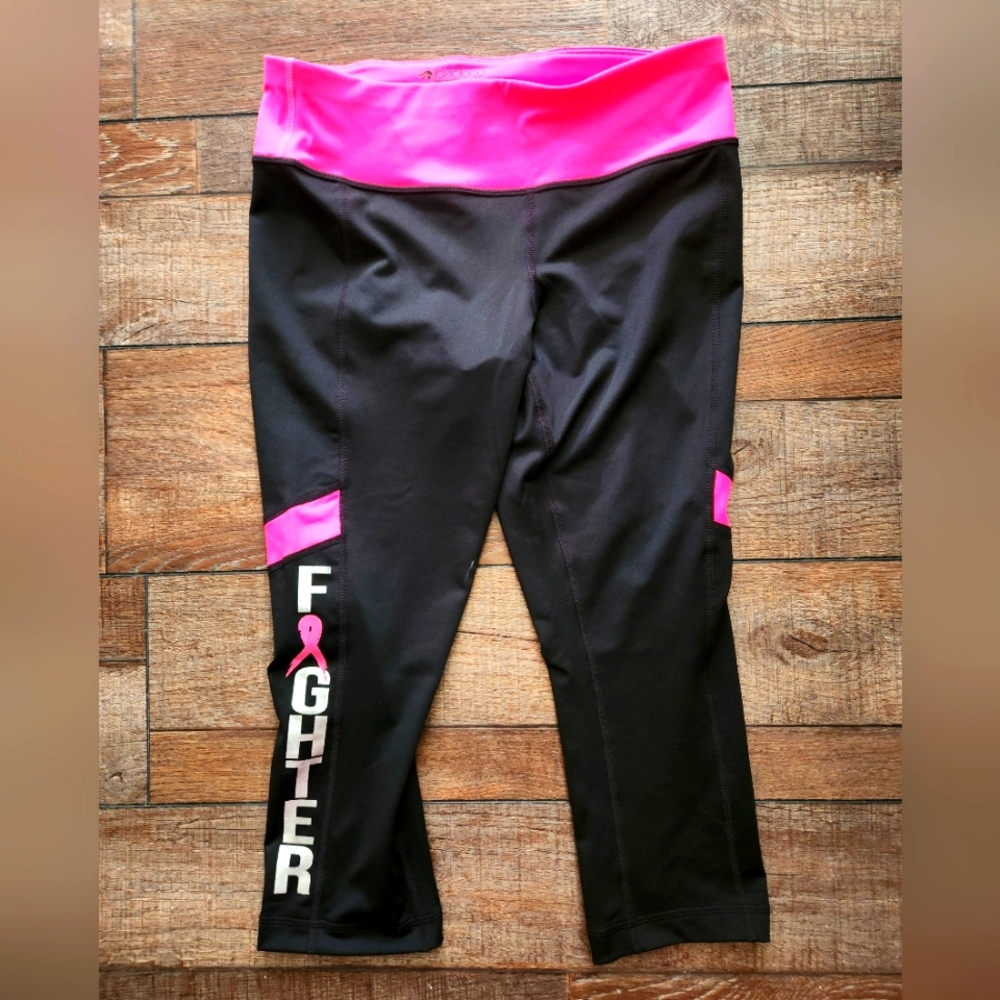 IDEOLOGY BREAST CANCER SURVIVOR KNEE LENGTH LEGGINGS.